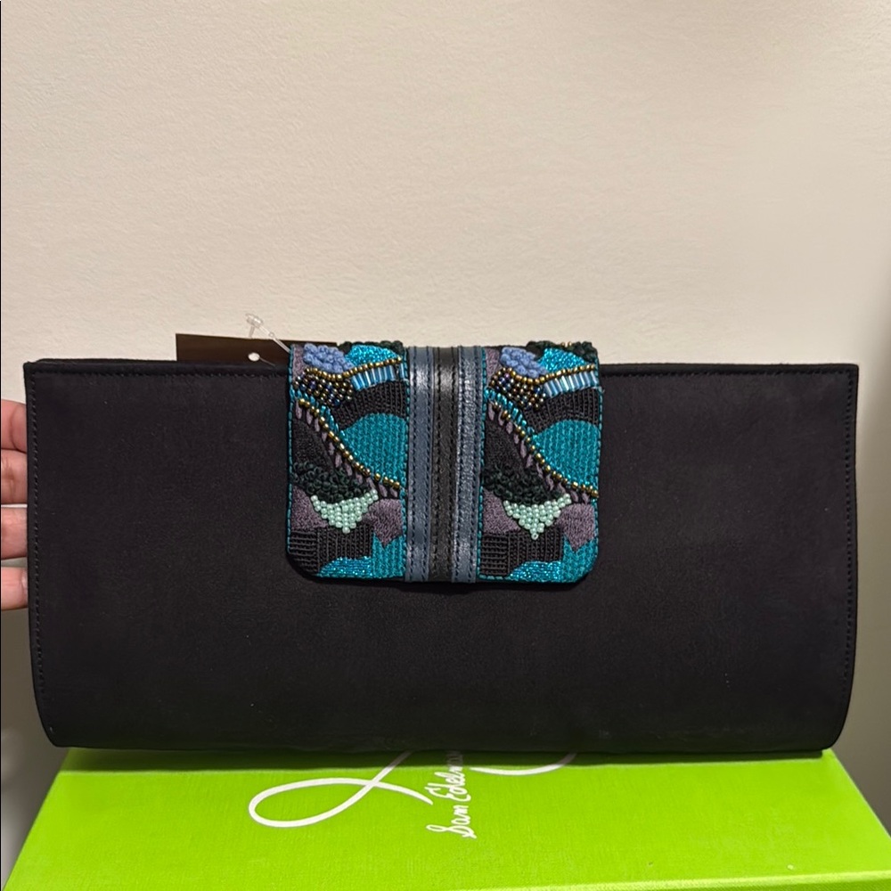 Elegant Black and Blue Clutch with Geometric Clasp